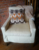 diamond orange and brown throw pillow