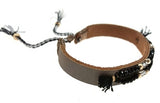 taupe leatherette bracelet with black and gold beads